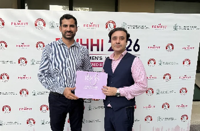 Receiving a plaque at the official launch and strategic roundtable